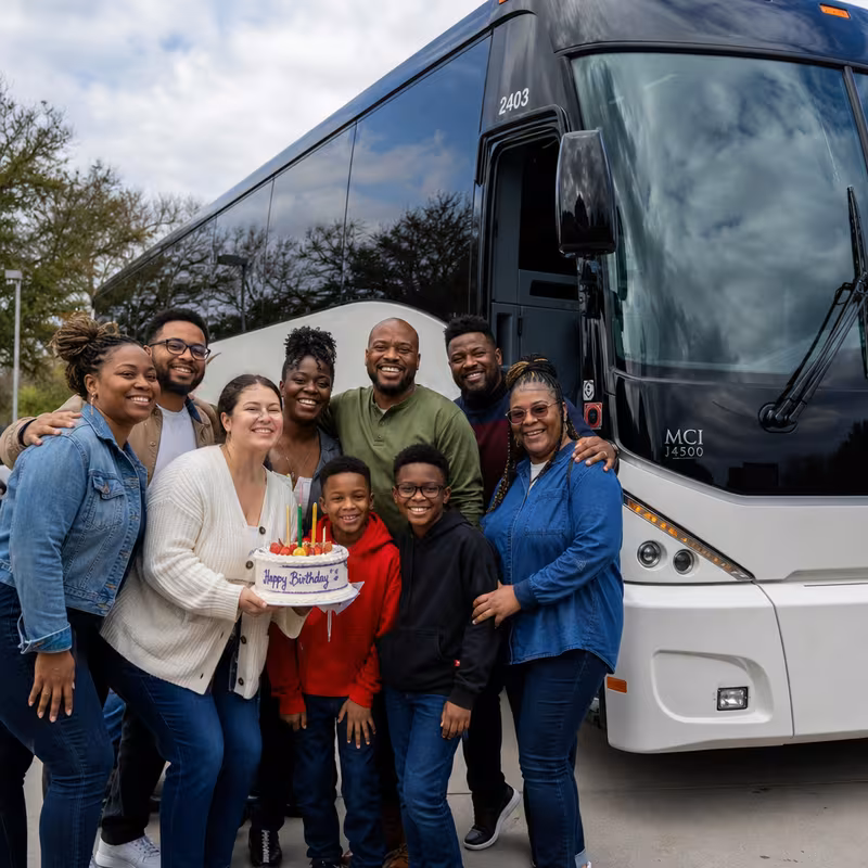 Passengers loading luggage while boarding an Savannah group shuttle