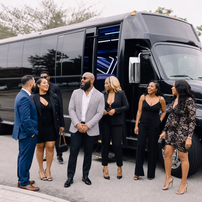Passengers loading luggage while boarding an Savannah group shuttle