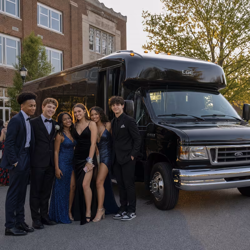 Group boarding a white charter bus for Prom & Homecoming Transportation transportation in Savannah