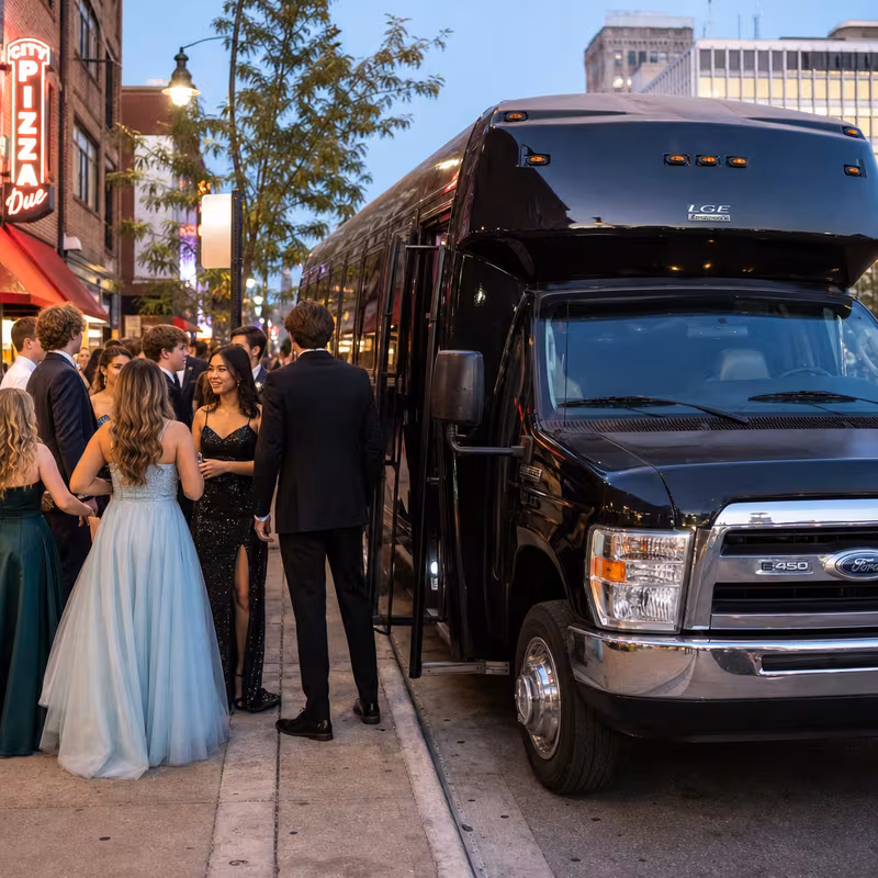 Passengers loading luggage while boarding an Savannah group shuttle