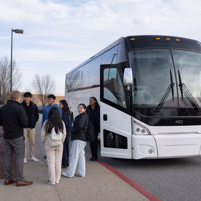 Black Mercedes Sprinter van staged for an Savannah School Transportation group