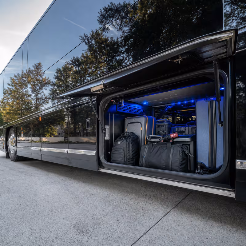 Party bus interior with wraparound leather seating and LED lighting in Savannah