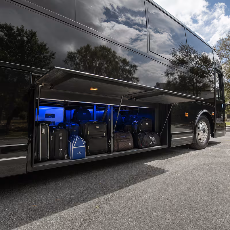 Party bus interior with wraparound leather seating and LED lighting in Savannah